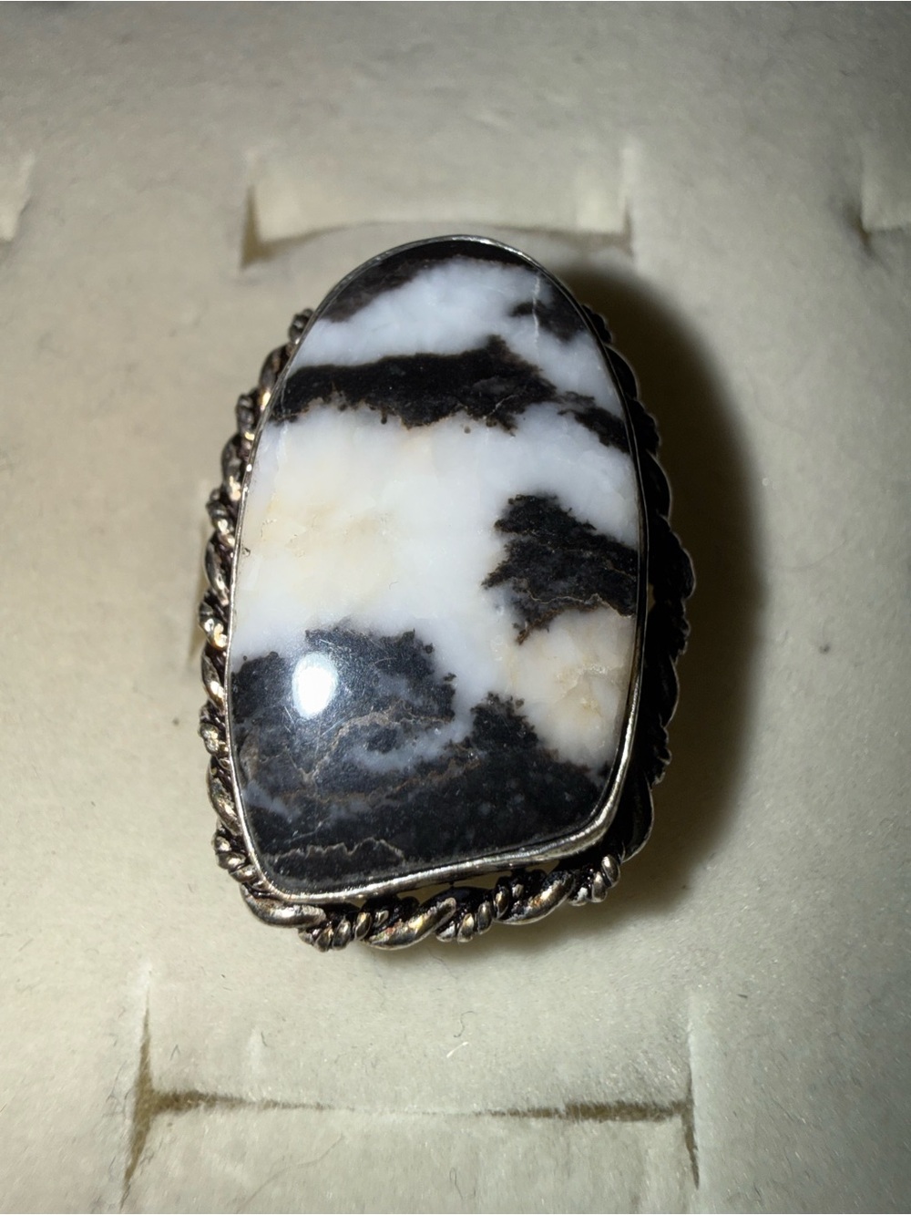 Natural white buffalo stone in a rope 925 setting